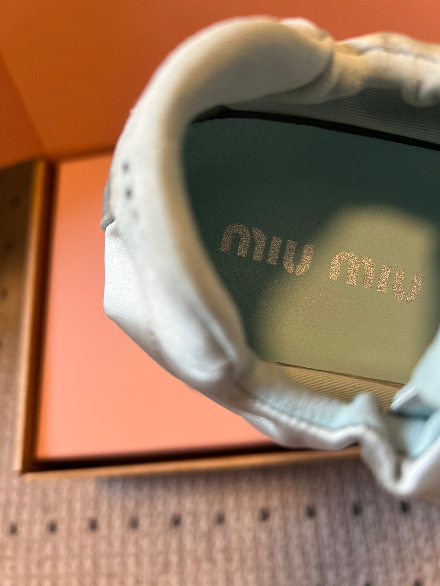 Miu Miu 2026  Plume Sneaker With Floral Charm Light Blue Satin 621342