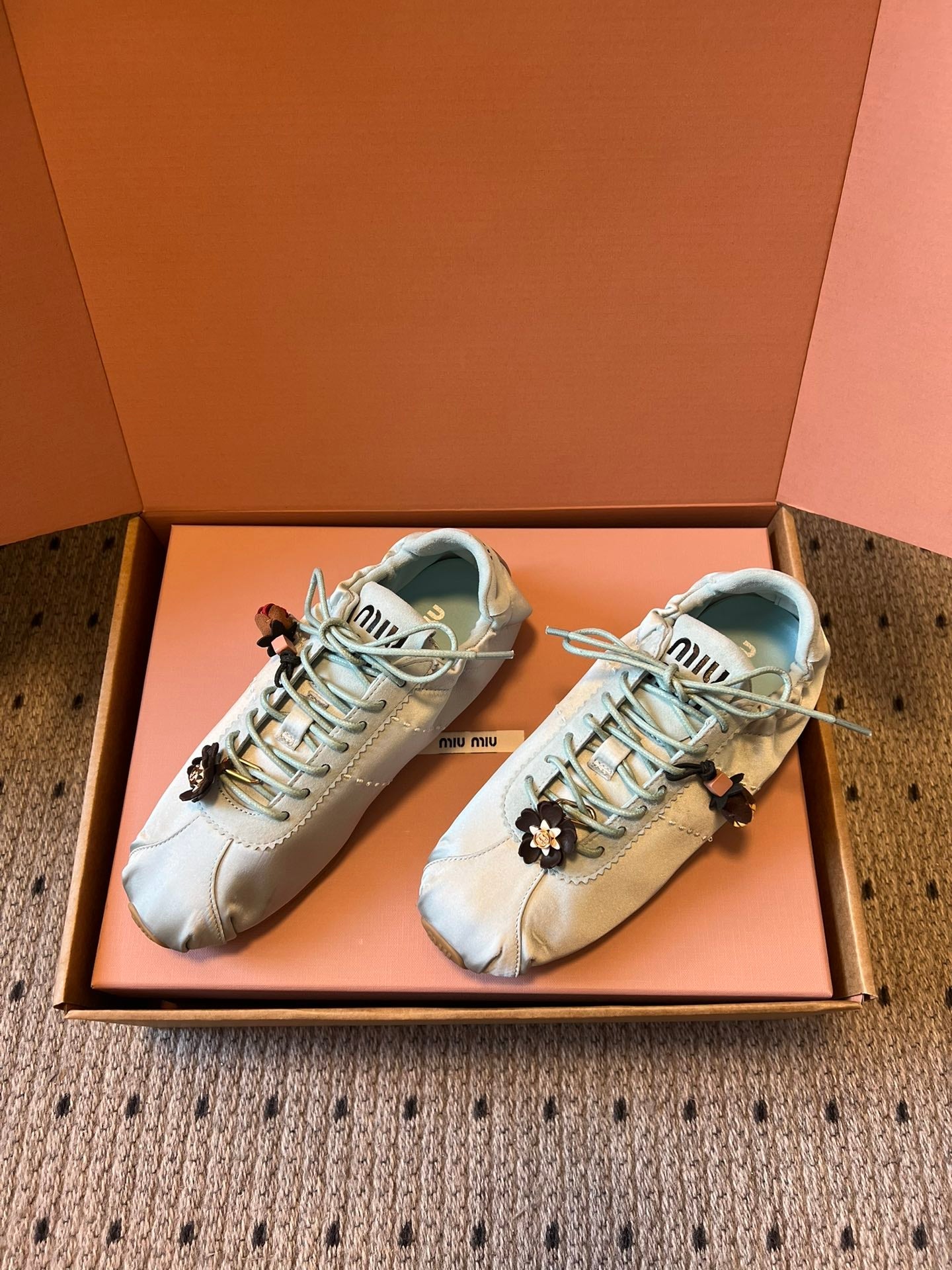 Miu Miu 2026  Plume Sneaker With Floral Charm Light Blue Satin 621342