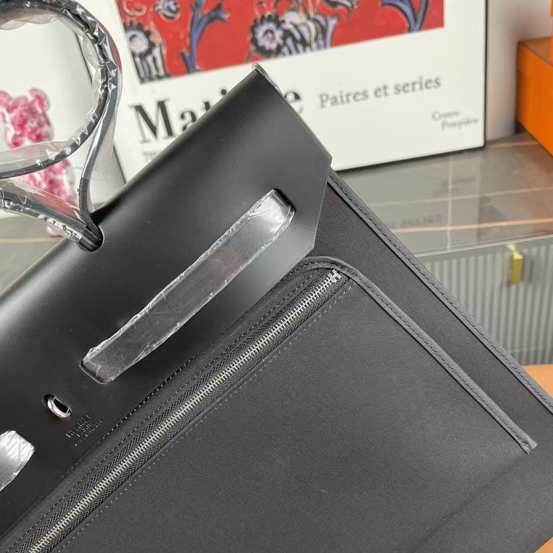 Herbag 39 Toile Black Canvas Black Cowhide Leather