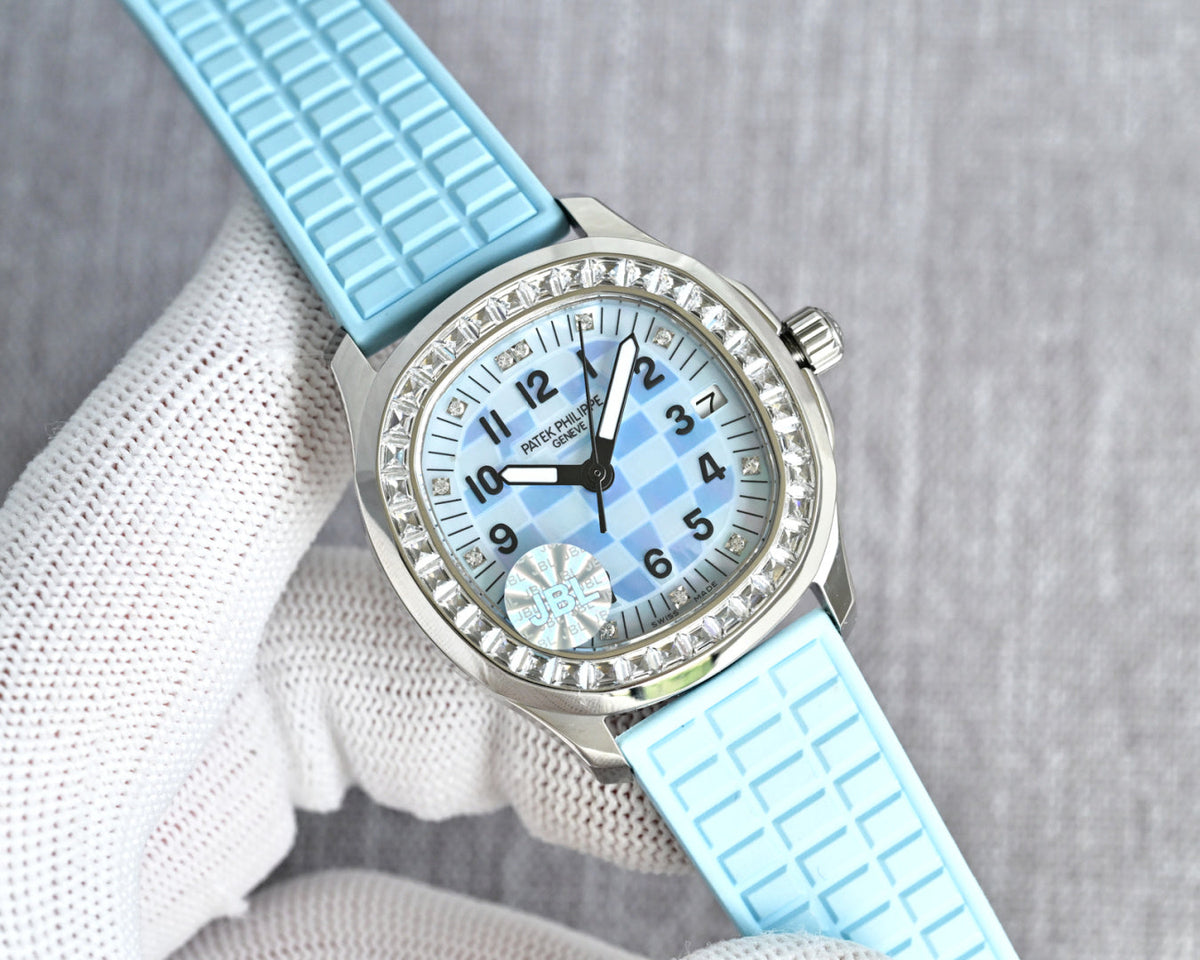 Patek Philippe  Aquanaut 35.6mm Blue Dial Blue Strap Watch