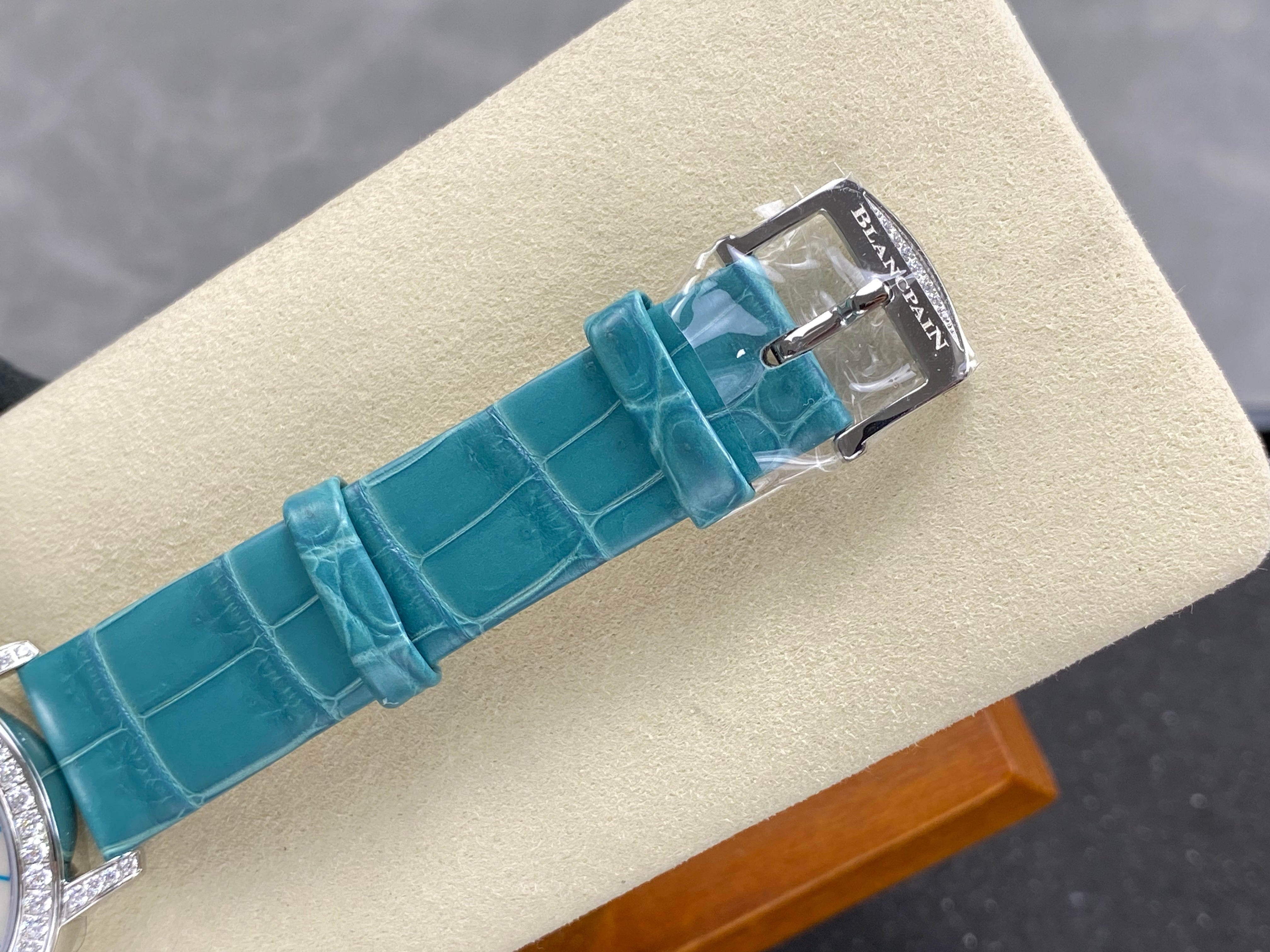 Blancpain's Ladybird 35mm White Blue Dial Diamond Bezel Leather
