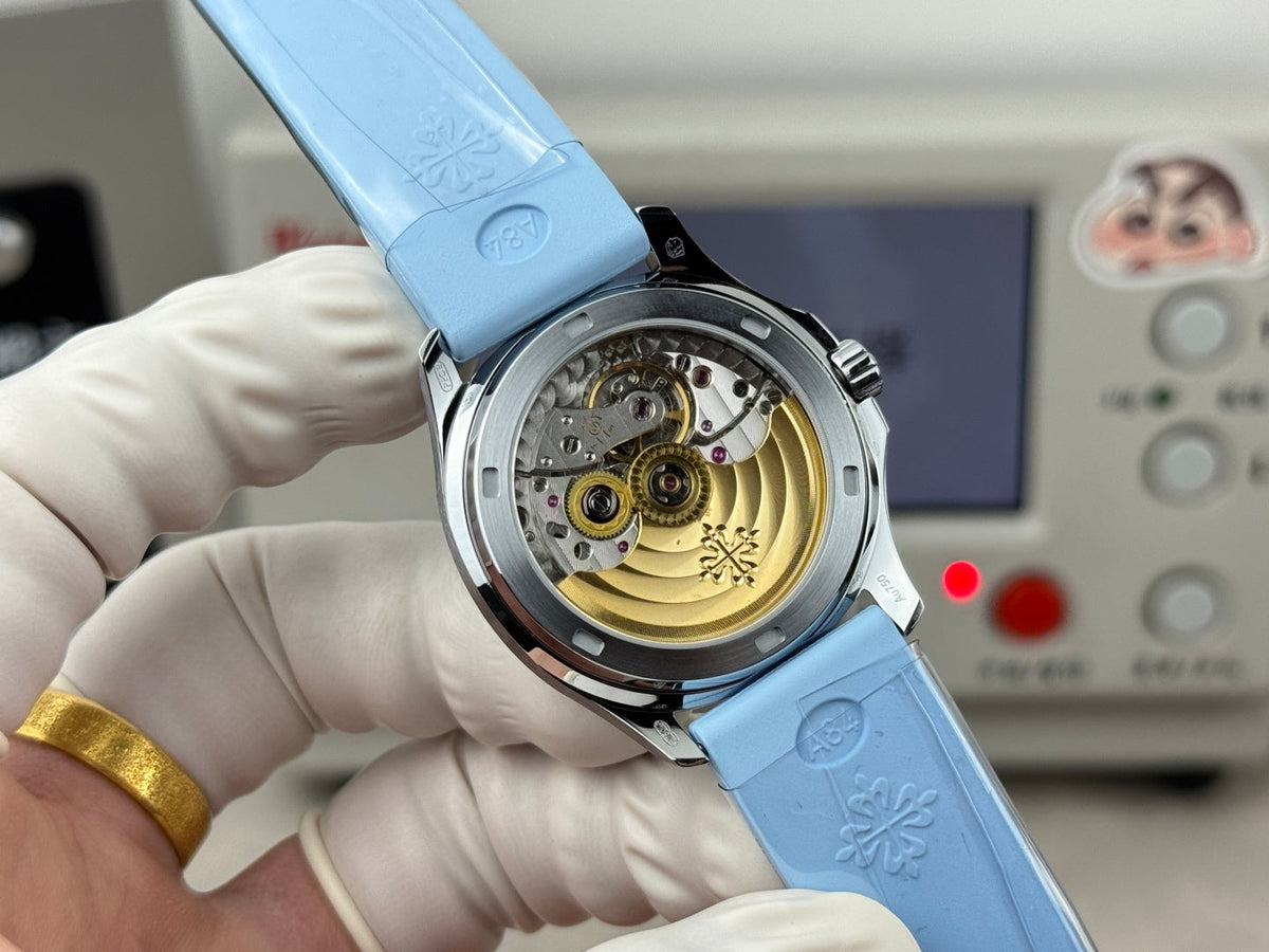 Patek Philippe Aquanaut 35.6mm Navy Blue Dial Blue Rubber Strap