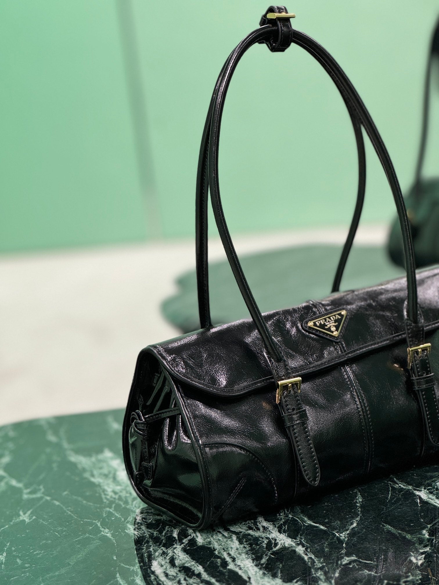 HANDBAG 31 IN BLACK OIL WAX LAMBSKIN