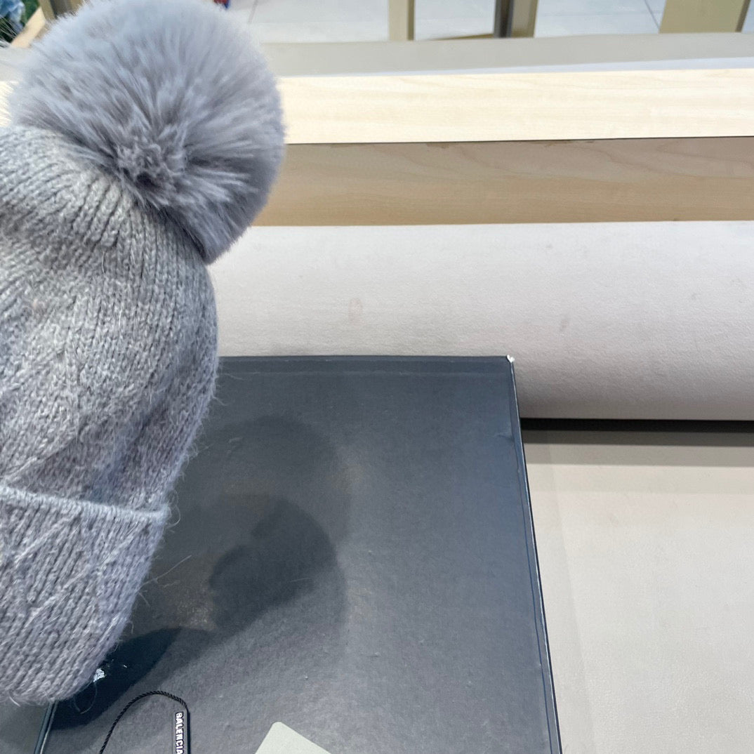 Balenciaga Knitted Hat with Pom-Pom 436967