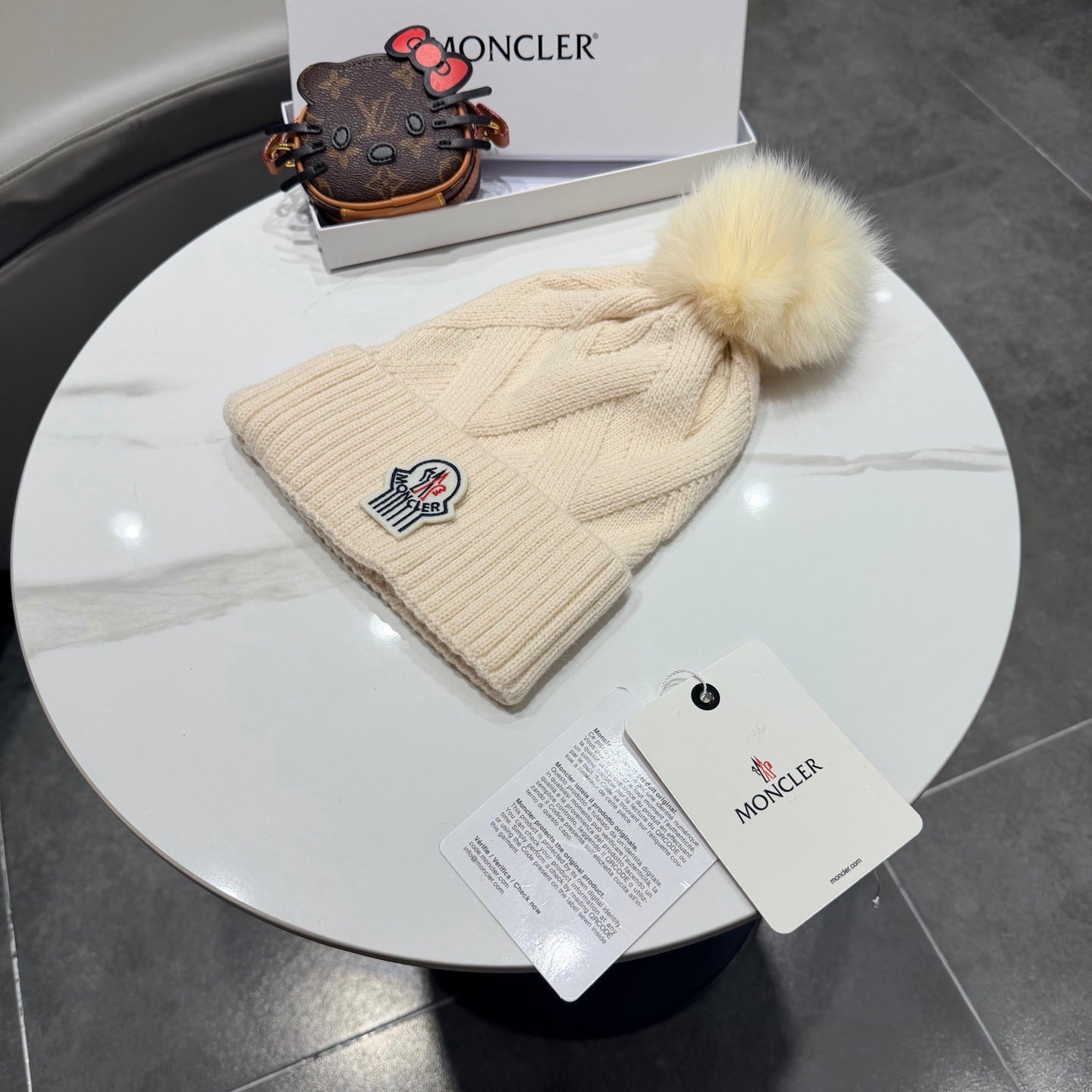 Moncler Wool Hat With Pom-pom 435188