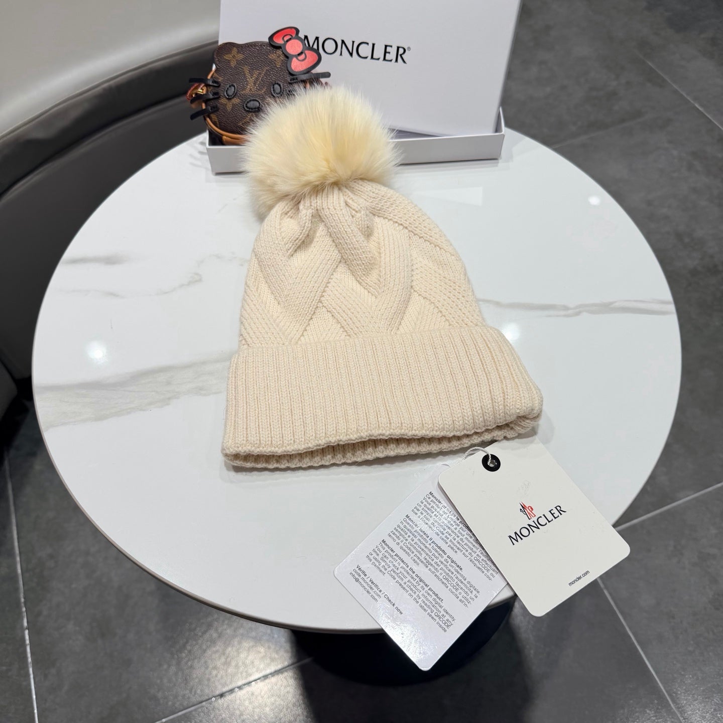 Moncler Wool Hat With Pom-pom 435188