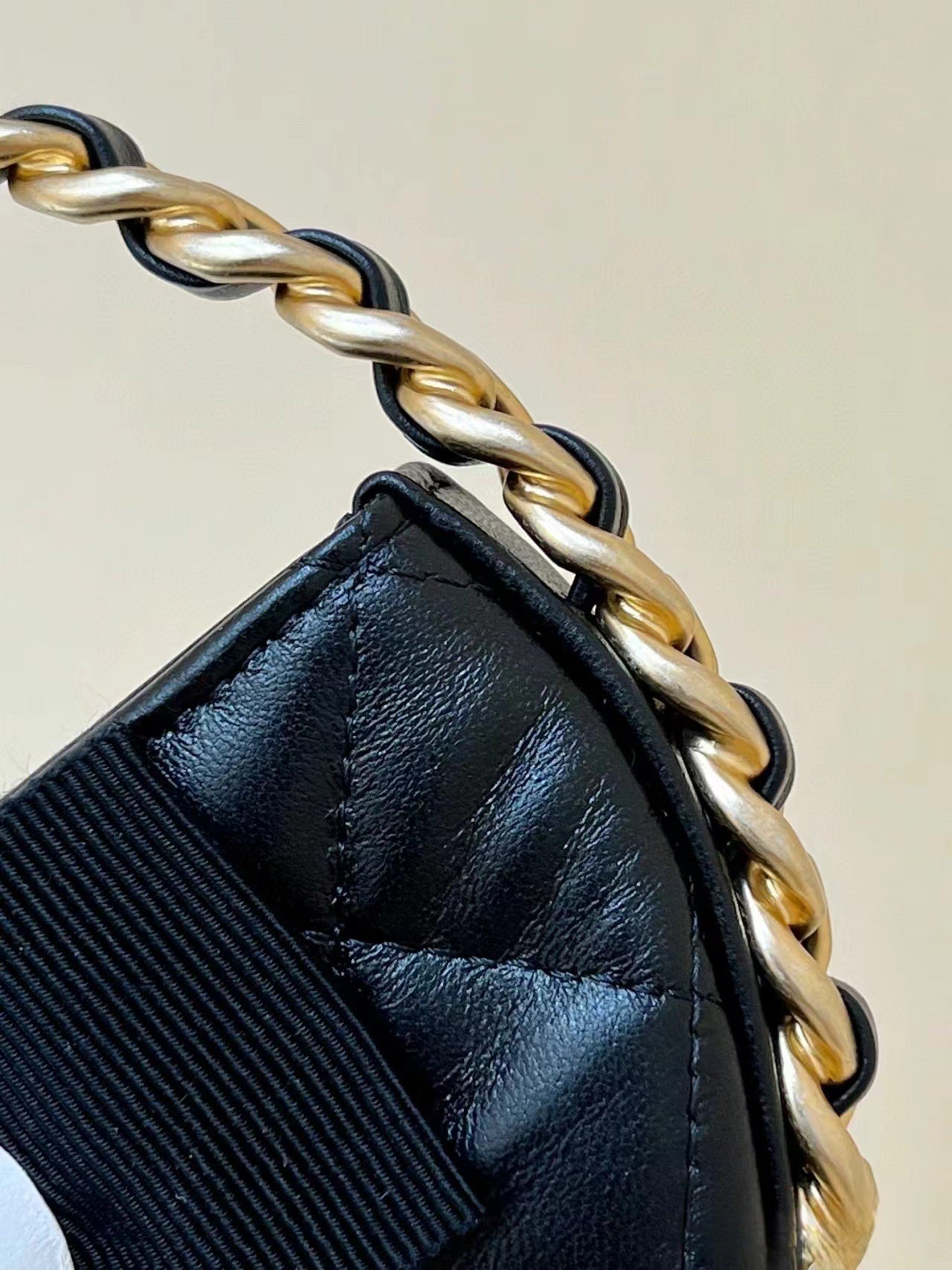 Chanel 2026 Quilted Round Camellia Mini Clutch 16cm Lambskin
