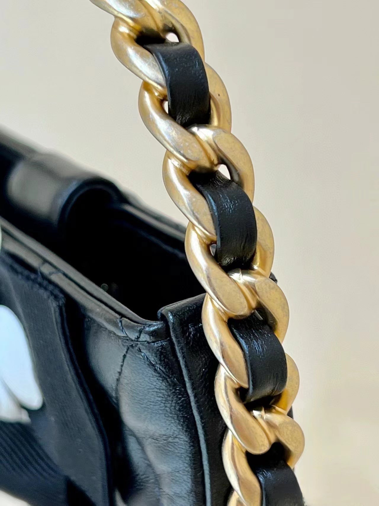 Chanel 2026 Quilted Round Camellia Mini Clutch 16cm Lambskin