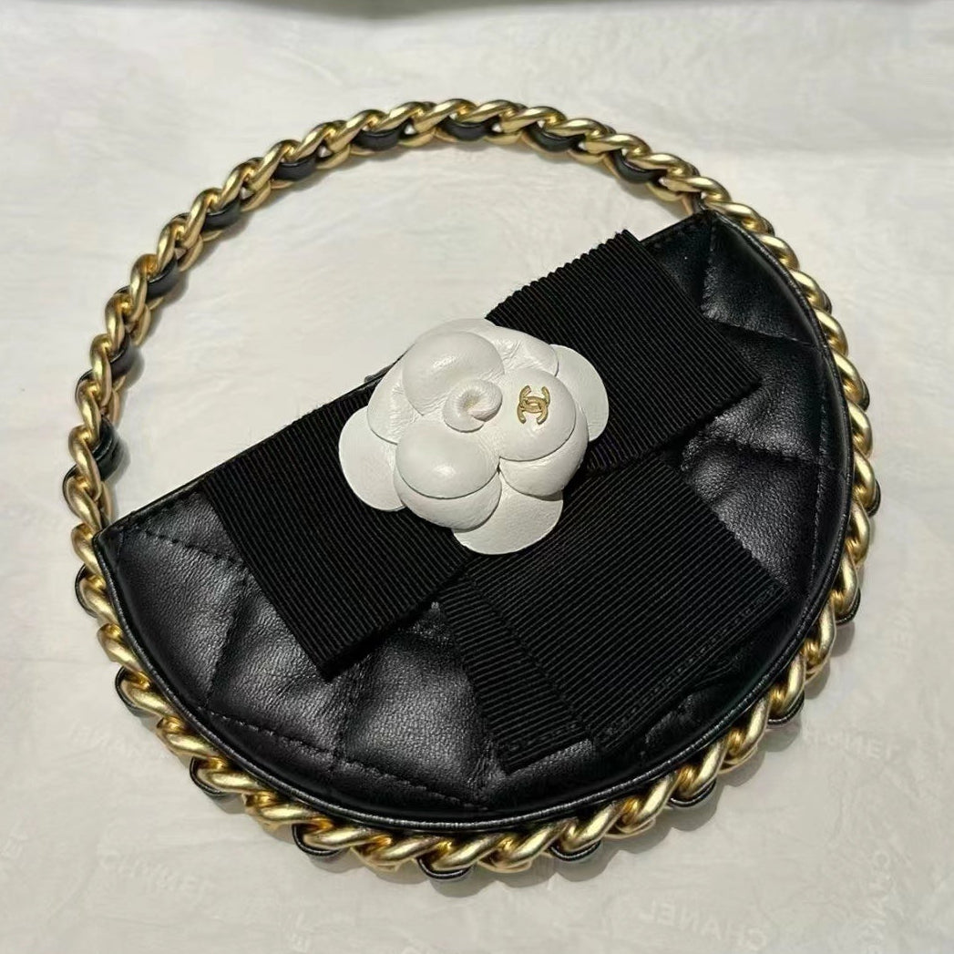 Chanel 2026 Quilted Round Camellia Mini Clutch 16cm Lambskin