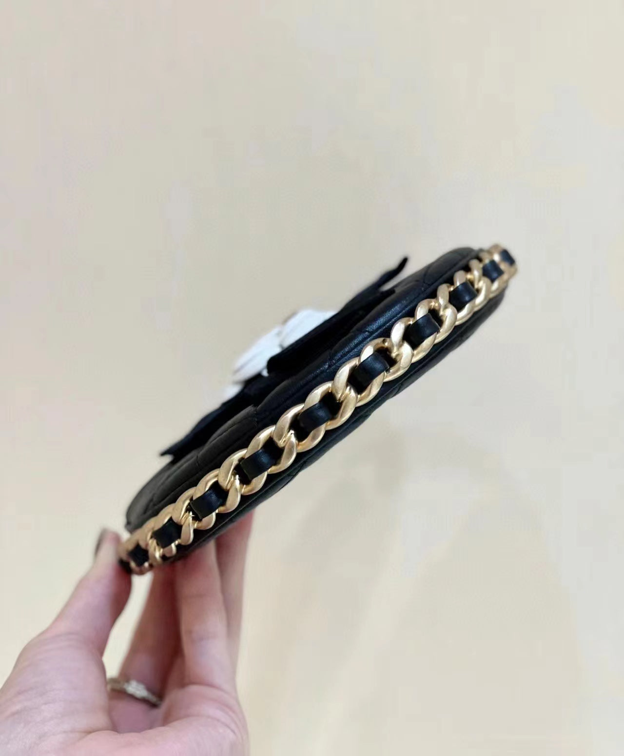 Chanel 2026 Quilted Round Camellia Mini Clutch 16cm Lambskin