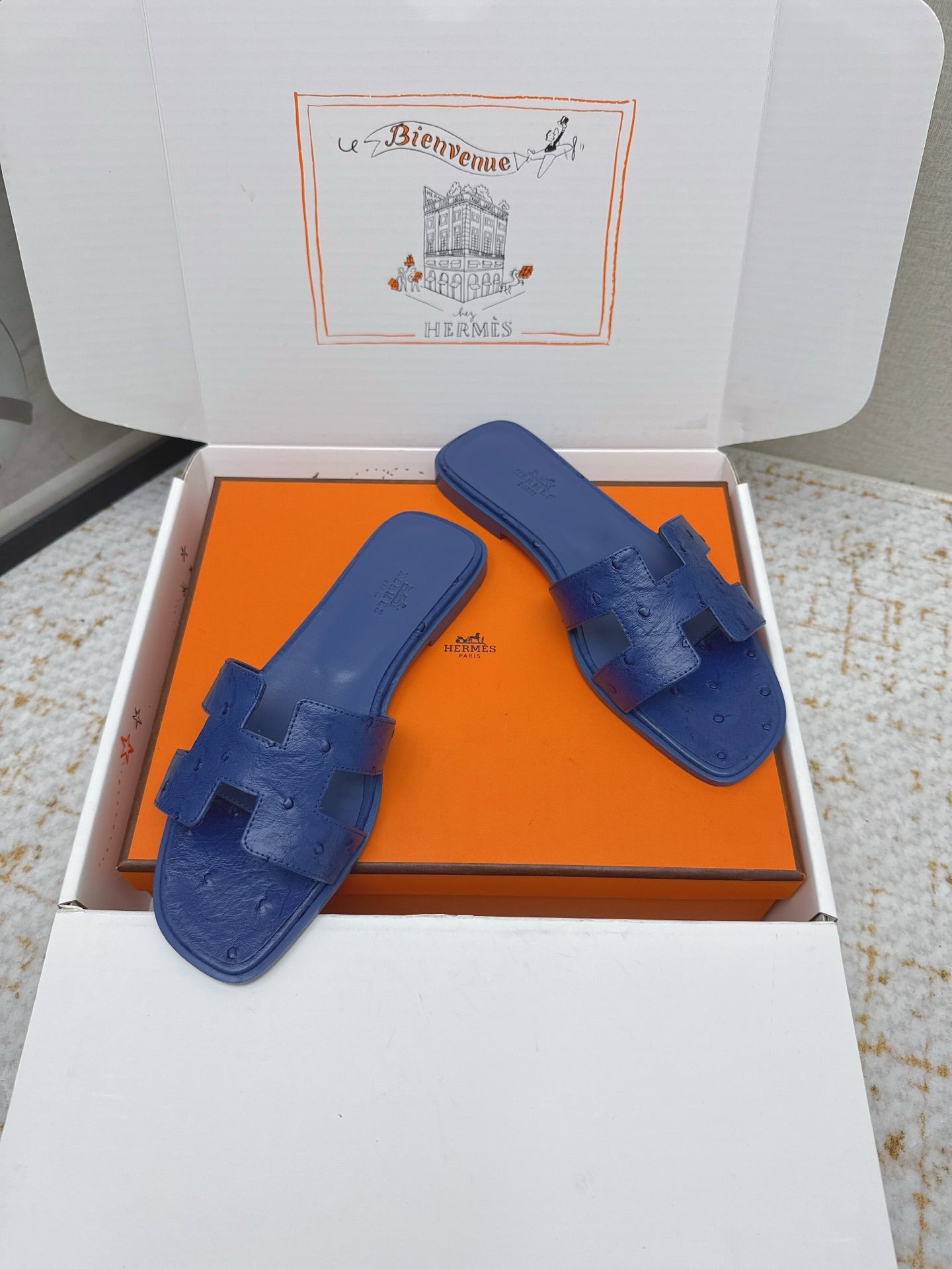 HM 26ss Oran Sandals Blue Encre Ostrich Leather 625091