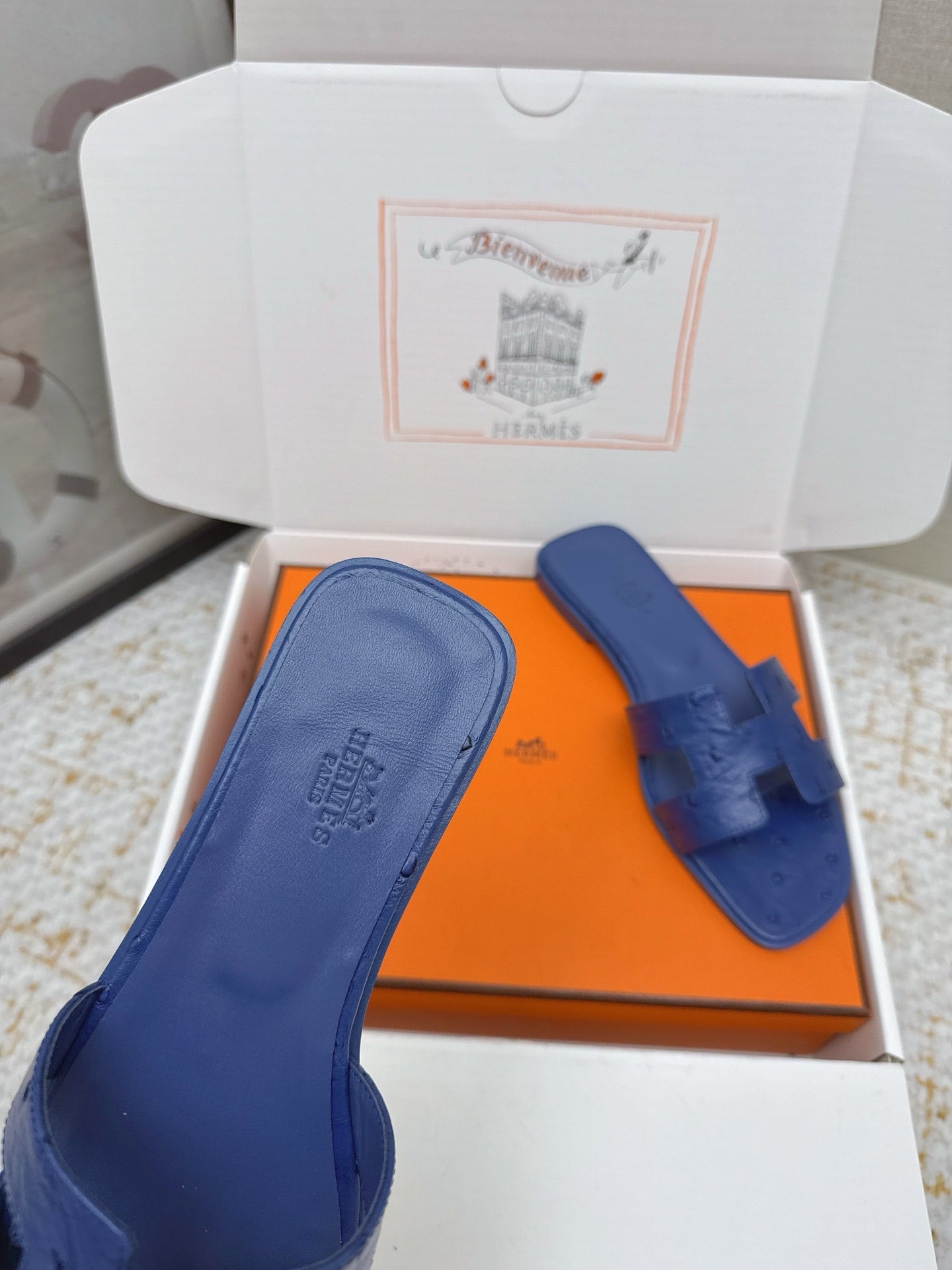 HM 26ss Oran Sandals Blue Encre Ostrich Leather 625091