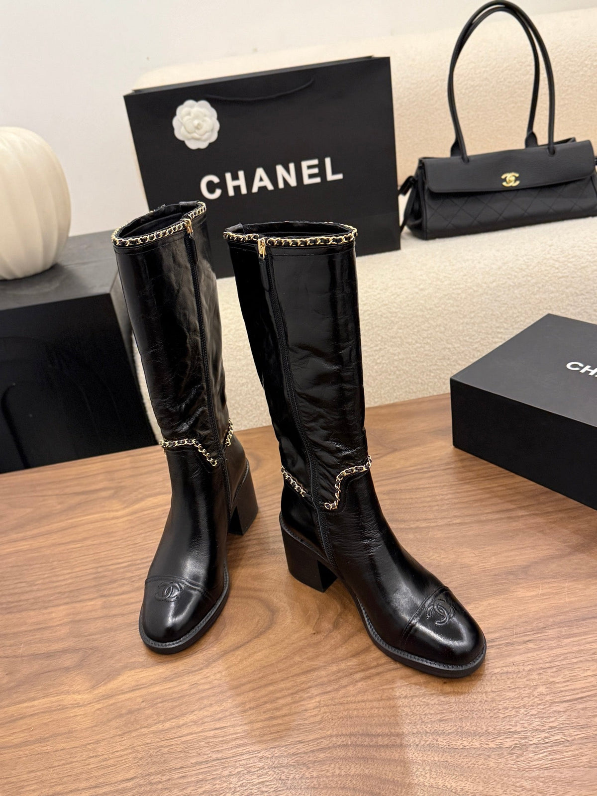 Chanel 2026 Crumped Cap Toe Chain Boots 65mm Leather 173455