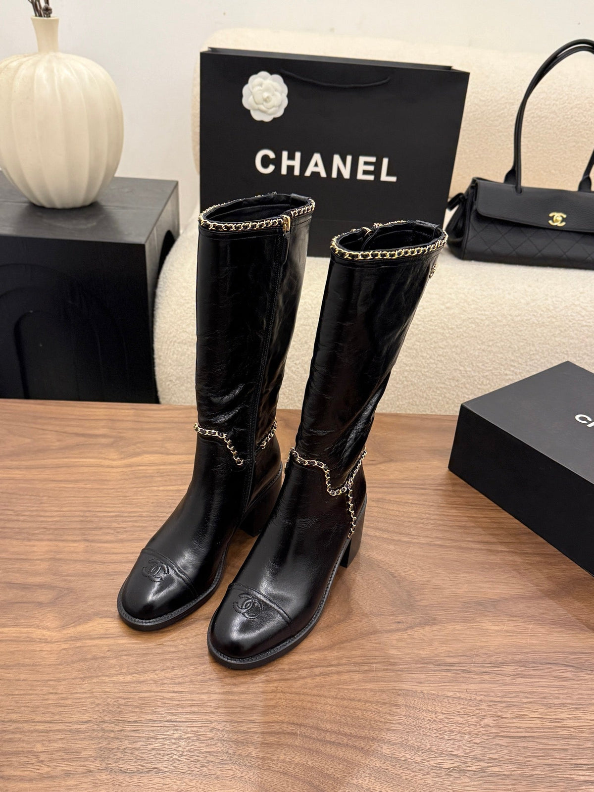 Chanel 2026 Crumped Cap Toe Chain Boots 65mm Leather 173455