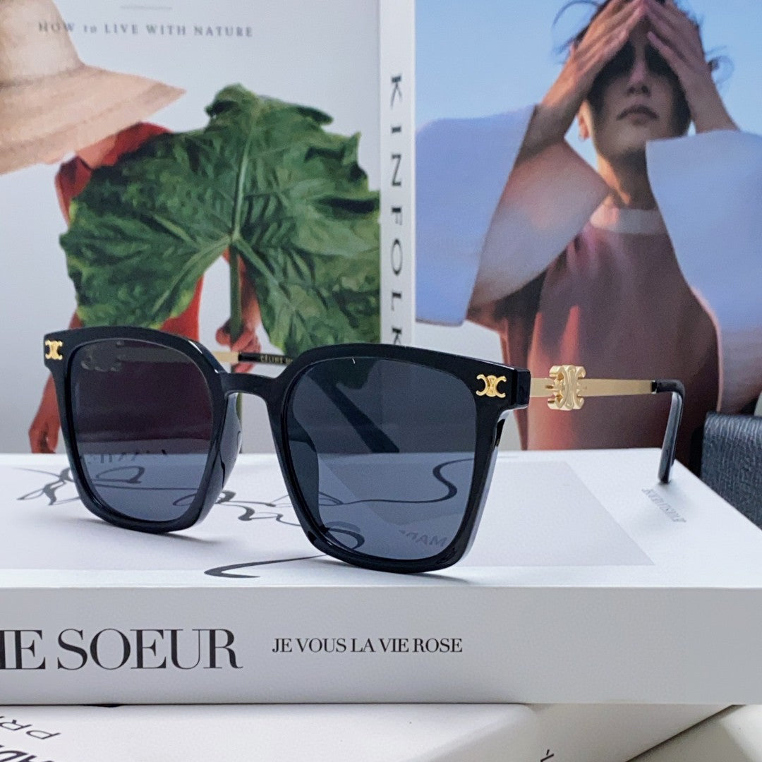 TRIOMPHE SUNGLASS 497820 IN GOLD METAL BLACK LENSES