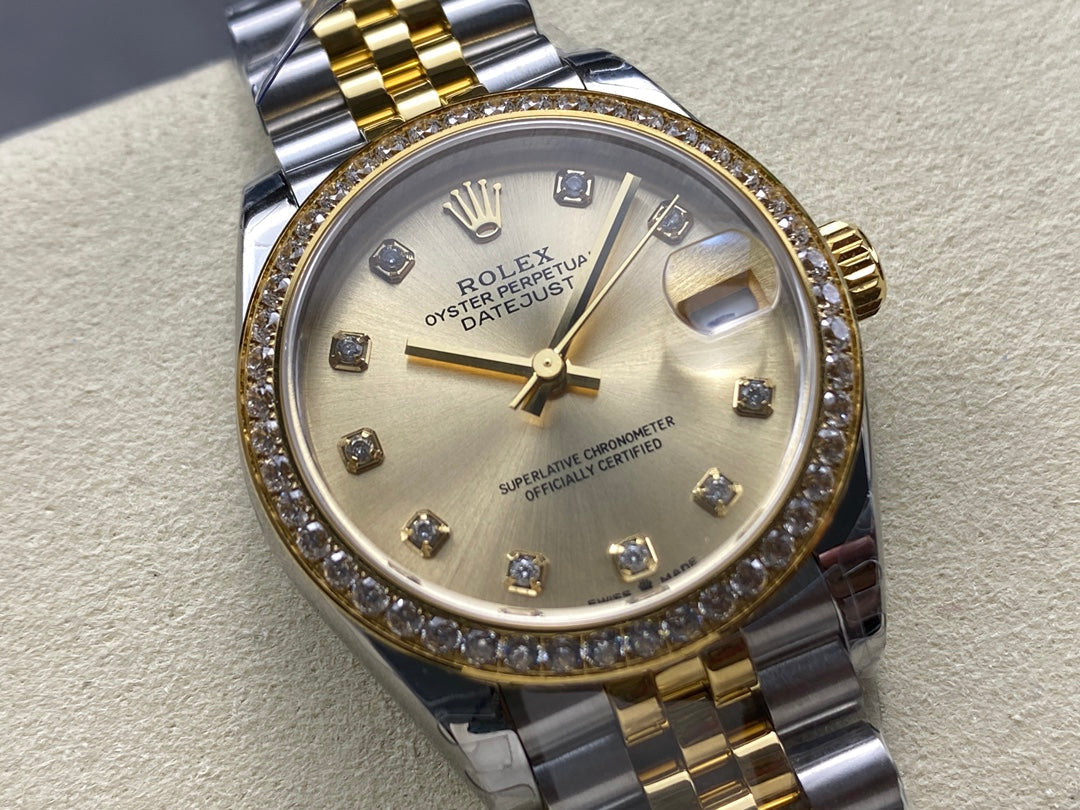 Datejust 31mm Yellow Gold Steel Diamond Bezel Champagne Dial Diamond Numerals
