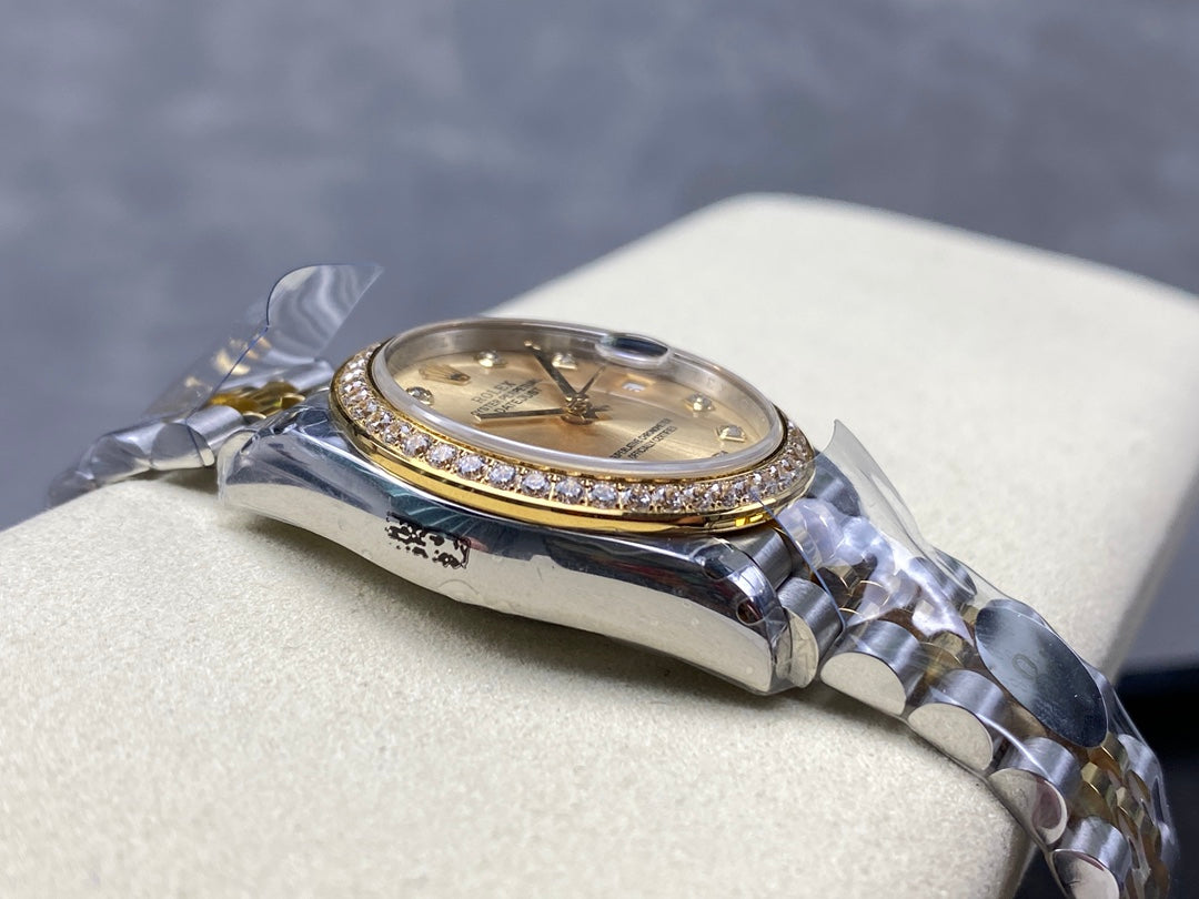 Datejust 31mm Yellow Gold Steel Diamond Bezel Champagne Dial Diamond Numerals